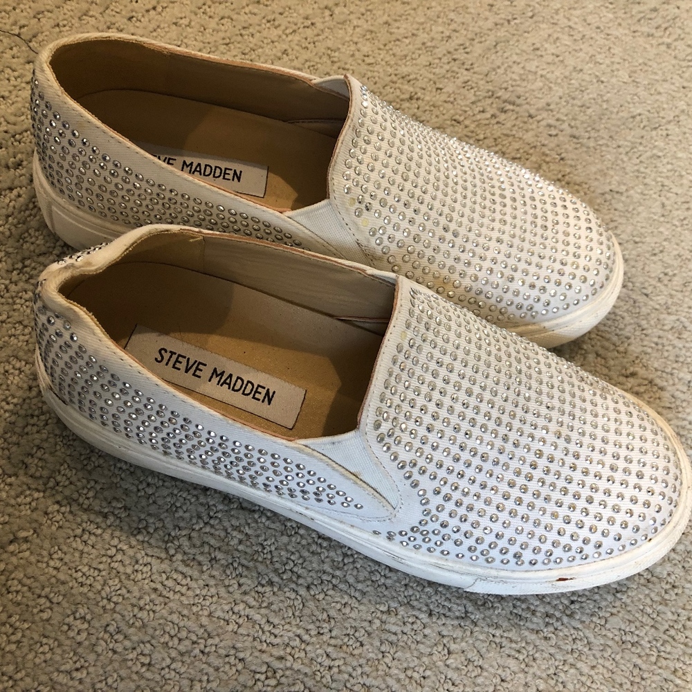 Steve Madden slip on sneakers with studs.
